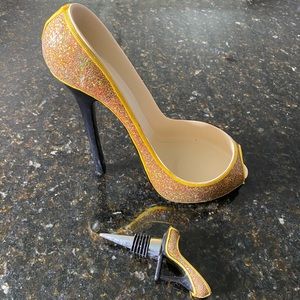 Wine holder and stopper.